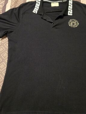 Black Polo Shirt with Decorative Collar and Chest Emblem
